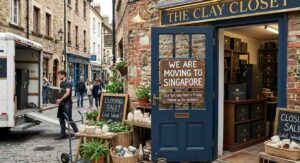 move business from Dubai to Singapore